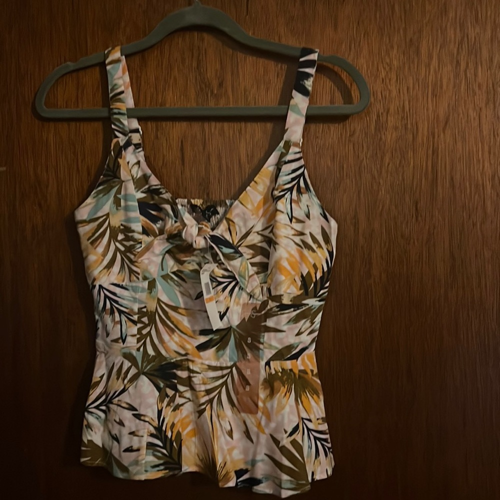 Jessica Simpson small tank top. Cute tie front with an open back. NWT